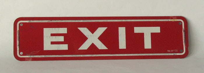 Vintage tin “EXIT” sign.