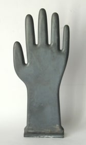 Vintage cast material industrial glove mold.