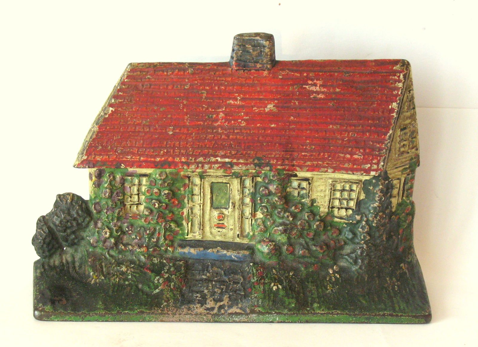 Antique cast iron cottage doorstop made by the Albany Foundry.: Title: Antique cast iron cottage doorstop made by the Albany Foundry. Date/Period: 1920's Dimension: 8 1/2” x 2” x 6” high Additional Information: Nice antique cast iron cottage door