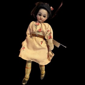 Antique 5 inch swivel head flapper doll