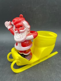 Vintage Rosbro Rosen Christmas Hard Plastic Santa in Yellow Sled Candy Container