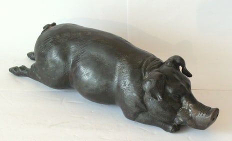 Large antique bronze wild boar sculpture.