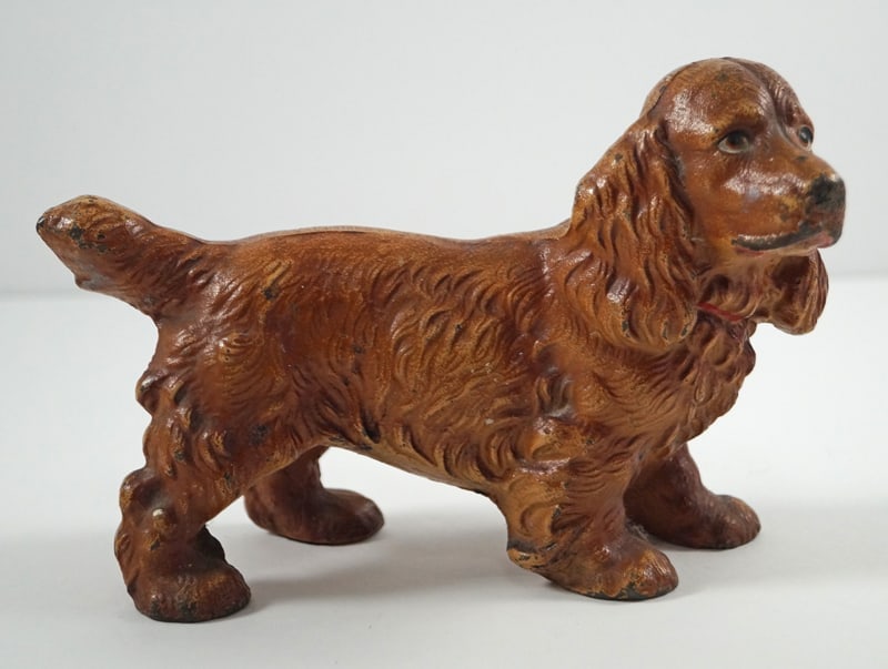 Cocker Spaniel Dog Cast Iron Hubley Doorstop: Title: Cocker Spaniel Dog Cast Iron Hubley Doorstop Dimension: 4 ½” tall x 6 ½” long. Date: Circa 1930’s. Additional Information: Full-figure, solid casting of a standing C