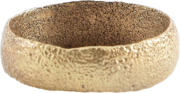 VIKING WARRIOR’S WEDDING RING, 9TH-11TH CENTURY AD, SIZE 10 ½+: Large size 10 ½+. Gilt bronze, rounded face 6.3mm width band width. Made with a core filling the inside which distributed the flowing metal and allowed for slower cooling. The core was then labor