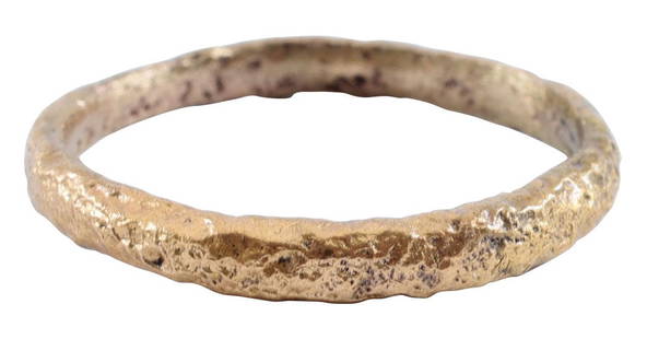 VIKING WARRIOR’S WEDDING RING, 9TH-11TH CENTURY AD, SIZE 7 3/4: Gilt bronze. Good wearable size 7 3/4. 2.4mm width band with rounded face. Vikings exchanged rings on the pommel of the groom's sword. Surface textured from burial. Professionally refurbished with the