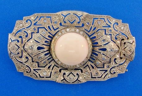ART DECO Platinum, Angel Skin Coral & Diamond Brooch Circa 1920s: DK Platinum, Coral & Diamond Brooch Antique · This is a most for a collector. The weight is 16.1 grams. The length is 2 ¼ inches. The height is 1 3/8 inches. The width is ¼ of an inch.