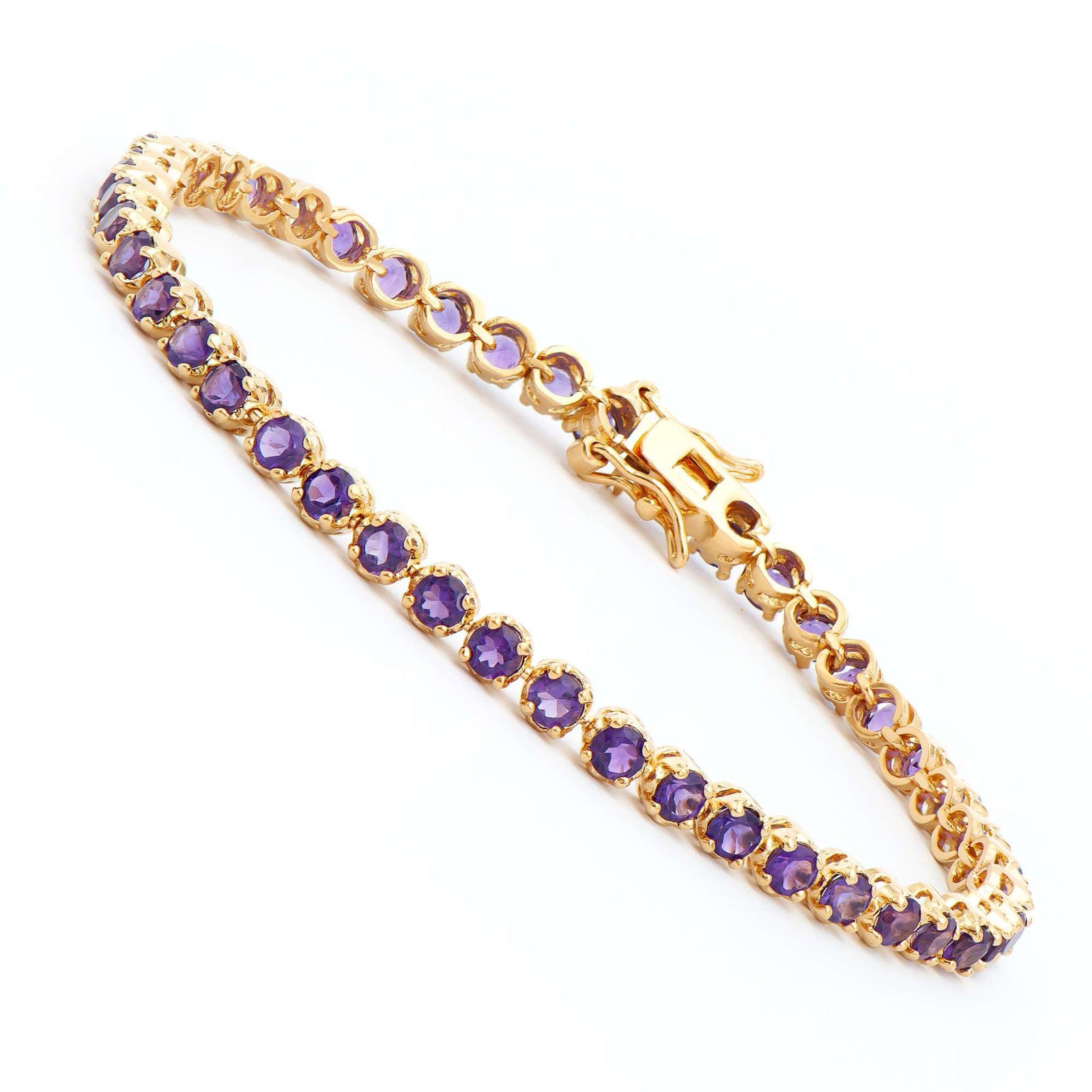 4.35 ctw Amethyst 18K Gold Plated Designer Bracelet 7.4 in: Title: 4.35 ctw Amethyst 18K Gold Plated Designer Bracelet 7.4 in Stone 1: Amethyst Color: Violet Shape: Round Size: 3mm Quantity: 46 CTW: 4.35 Plating Material: 18K Yellow Gold Primary Material: Base