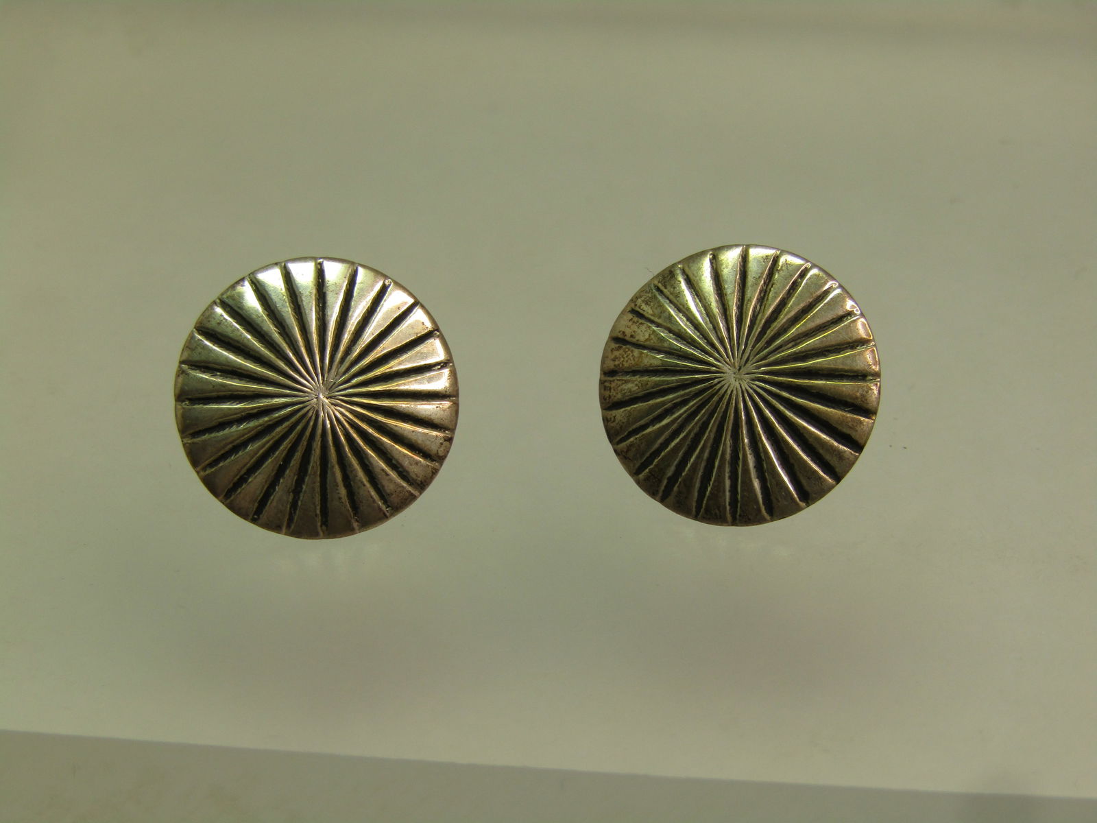 Vintage Sterling Southwestern Concho Style Earrings, Pierced Studs, On Card, 1980's-1990's Est.: Vintage Sterling Southwestern Concho Style Earrings, Pierced Studs, On Card, 1980's-1990's Est. These are sightly domed 14.5mm round concho style southwestern earrings that weight appx. 2.64 grams and