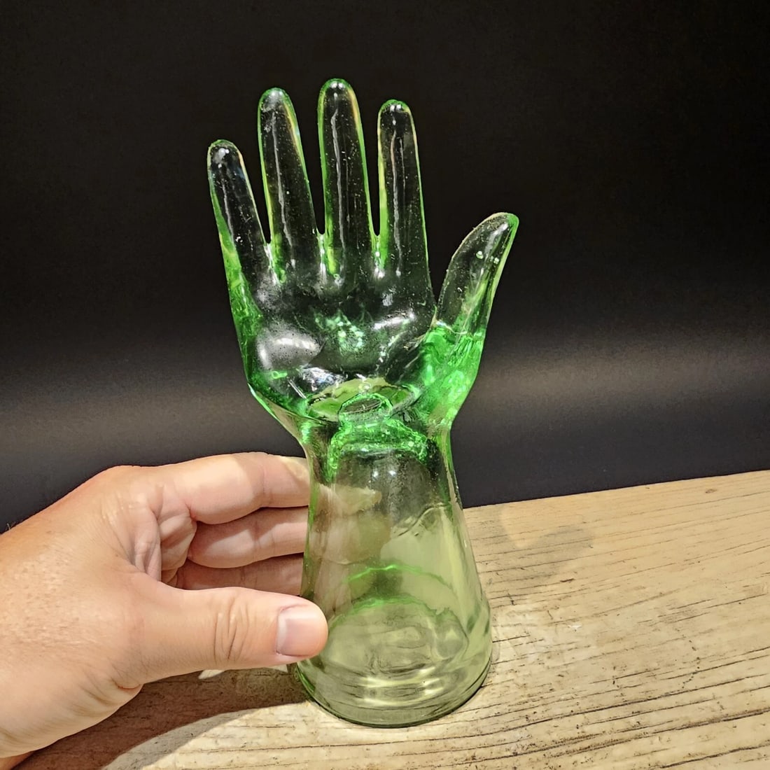 8" Green Depression Glass Ring/Glove holder: 8" Tall 4" Wide Wonderful reproduction green glass hand ring holder. Beautiful display for decoration or use. The wonderful light green color really catches your eye, certainly a must-have for any gla