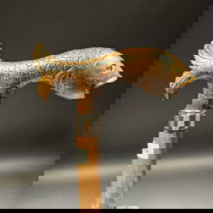 36" Italian Trout Head Walking Stick Cane: 36" Long 3/4" shaft Appearance: The handle is derby-shaped, brown with a wood-tone finish, and has a full fish design with glass eyes and a brass ring. Material: The handle is made from cellulose acet