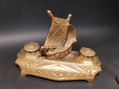 Brass Sailboat Double inkwell Desk Set: 7 3/4" wide x 5" tall Nice! reproduction antique brass inkwell. The two inkwells have small brass inserts to make cleaning easier. Great wide sturdy base to prevent tipping! Solid aged brass with grea