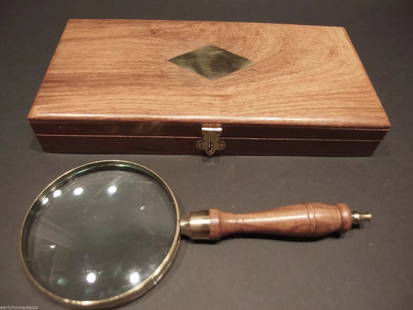 Magnifying Glass Brass w Wood Turned Hand Lens Desktop Box: Description Box is 10 1/2" wide x 5 1/4" Mag Glass is 5x magnification 4" Wide 9" Long Nice reproduction of an antique Magnifying glass with wood box. Magnifying glasses like this were used in the 18t