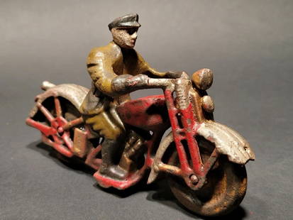 Cast Iron Toy Motorcycle 1 Patrol Rider: 6 1/2" Long x 4" tall Such a neat reproduction cast iron motorcycle! As you can see this heavy cast iron pull toy motorcycle was wonderfully hand painted and distressed to look like an original antiqu