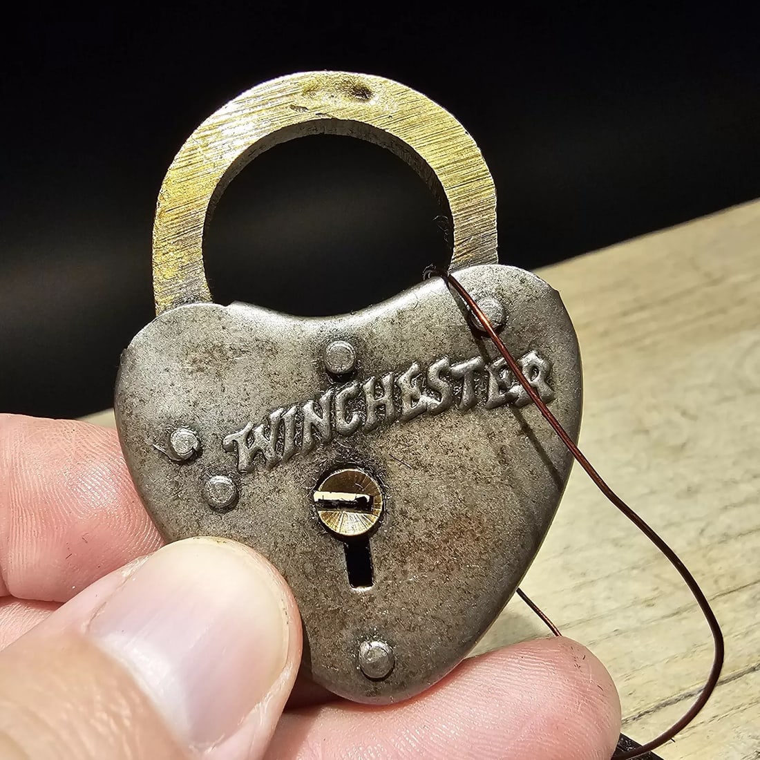 Brass Winchester Firearms Ammo Box Padlock Lock & Key: 2 1/4" x 1 1/2" Wide Nice reproduction breass and iron winchester padlock! This lock is fully functional! Hard to tell its age. sheet iron and brass. Great aged patina throughout. Limited quantity ava