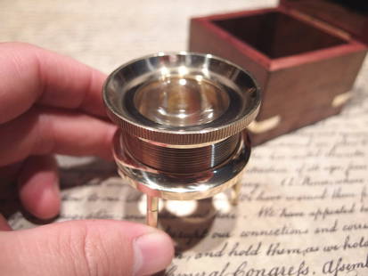 Brass Chart Map Glass Magnifying Desk Lens Magnifier w Box: Glass is 1 7/8" Wide x 2" High,.. adjustable to 2 1/2" box is 2 3/4" x 2 3/4" x 2 3/4" Nice reproduction of an antique magnifying lens. Nice heavy quality thick glass. This piece slides along the surf