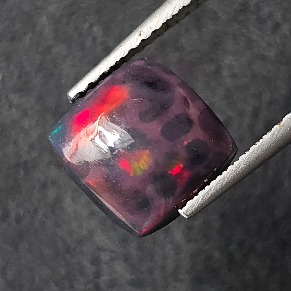 1.51 Ct "Play Of Colors" Natural Black Opal (1 of 2)