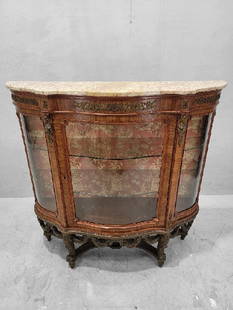 Antique French Louis Style Curved Glass Marble Top Vitrine Display Cabinet: Vintage from before 2000 Materials: marble, glass, wood, metal, bronze Width: 53.5 inches Antique French Louis Style Curved Glass Marble Top Vitrine Display Cabinet This exquisite Antique French Louis