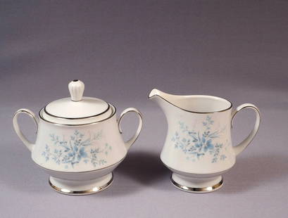 VINTAGE NORITAKE CAROLYN Creamer Milk Jug Cover Sugar Bowl SET Silver Platinum: This very beautiful Covered Sugar Bowl and Creamer/Milk Jug Set is made by Noritake in Carolyn pattern. The pattern was made around between 1970 and 1994s. The pattern has blue and white flowers, silv