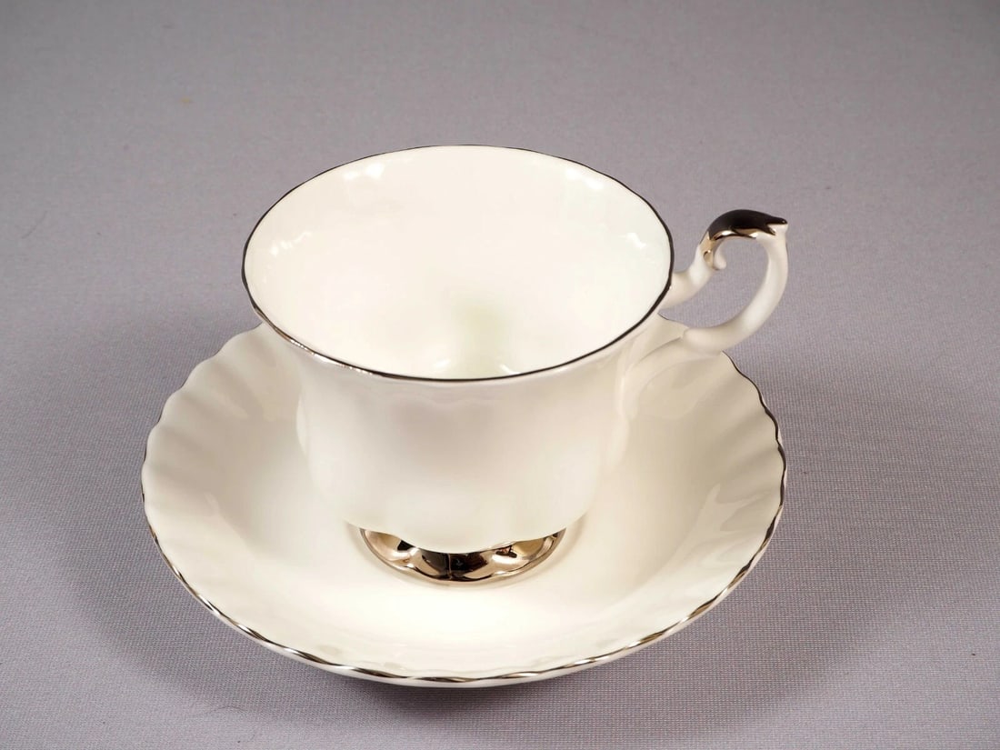 Royal Albert CHANTILLY Coffee Tea Set Cup Saucer Set White Silver Platinum: This is a gorgeous Bone China Tea/Coffee Cup and Saucer set from the famous Chantilly collection by Royal Albert - Made in England. The rims of this pattern with hand-applied bands of platinum rim on