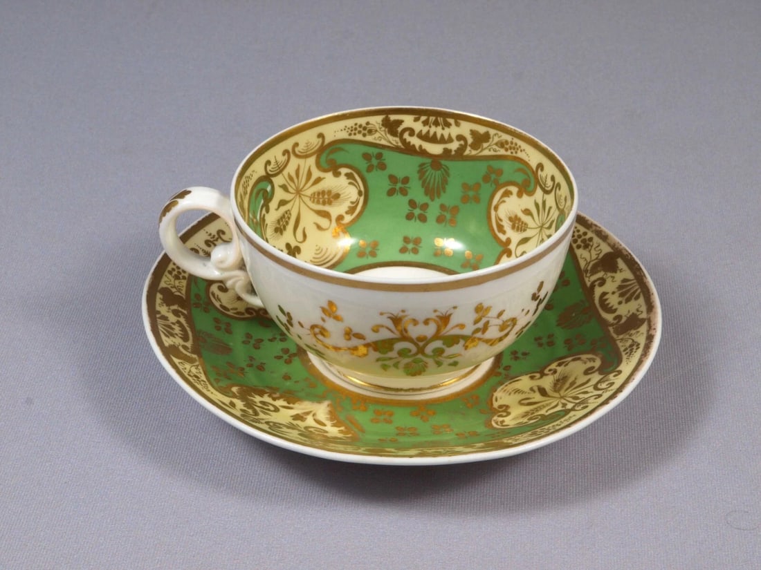 Antique 1813- 1830 Copeland Spode Coffee Tea Cup Saucer Green England Felspar: This is a gorgeous set of one Coffee/Teacup with Saucer made by Copeland Spode in England. According to backstamp was made between 1780 and 1820. The pattern is very classic with gold scrolls and leav
