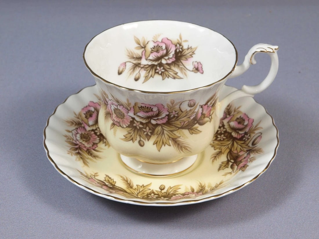 Royal Albert MELODY SERIES SONATA Coffee Tea cup Saucer England Vintage: This an absolutely stunning Fine Bone China set of Tea/Coffee cup and Saucer. The set is from Melody Series in Sonata pattern. The set is made by Royal Albert in England.It is properly marked with Roy