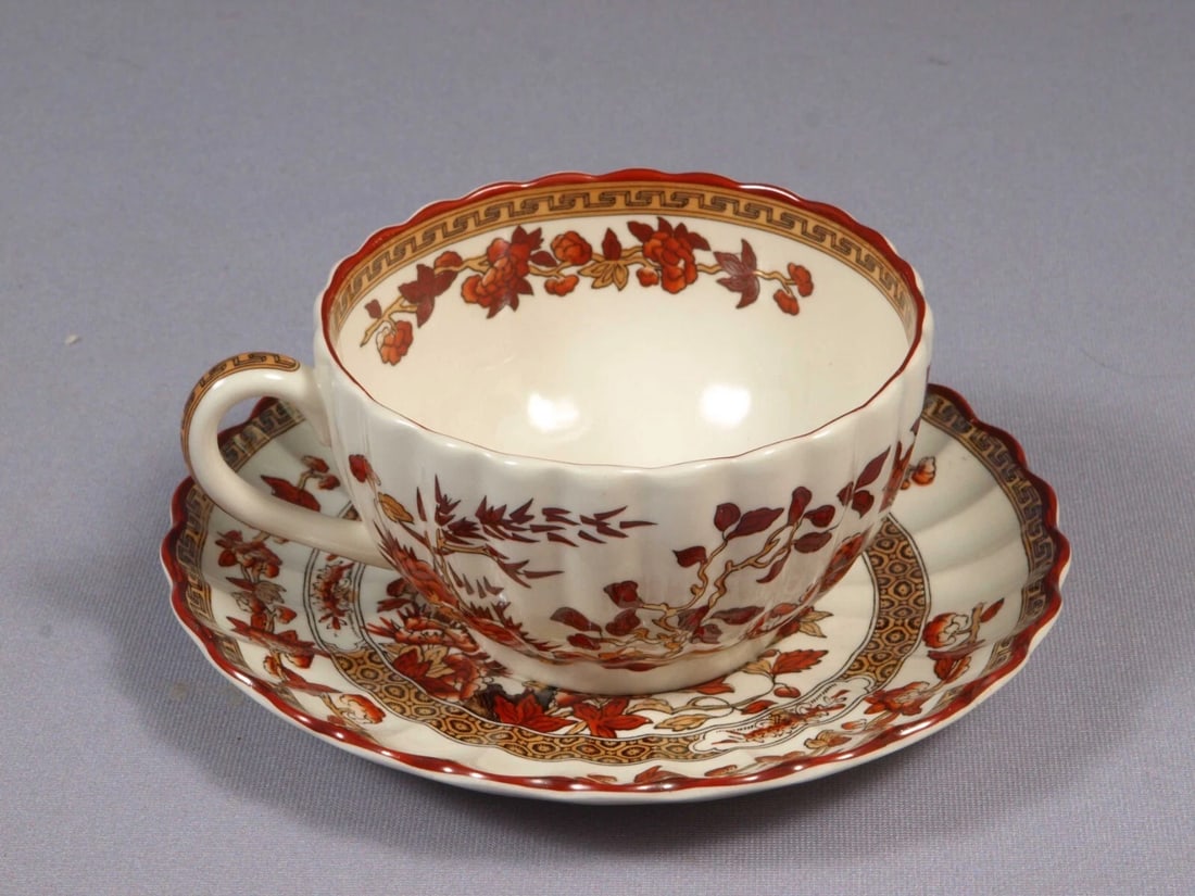 Copeland Spode Indian Tree Rust Orange Coffee Tea Cup Saucer Set England: This is a beautiful Antique Copeland's Spode Coffee/Tea cup and Saucer Set in rust Indian tree pattern. It is decorated in the rust and oranges tree, flowers and leaves. This amazing set is both Agele