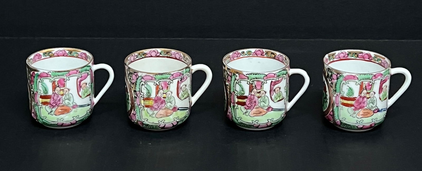 Chinese Art Famille Rose Set of 4 Tea Cups: Title: Chinese Art Famille Rose Set of 4 Tea Cups Date/Period: Late 20th Century Dimension: 2" h x 3" w Material: Porcelain Additional Information: Chinese Art Famille Rose Set of 4 Tea Cup Reserve: $