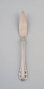 Early Georg Jensen Lily of the valley fish knife in solid silver (830). Dated 1915-1930. Six pieces: Title:Early Georg Jensen Lily of the valley fish knife in solid silver (830). Dated 1915-1930. Six pieces in stock. Description:Early Georg Jensen Lily of the valley fish knife in solid silver (830).