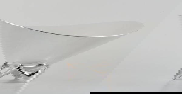 Henning Koppel for Georg Jensen, colossal sterling silver bowl on three-legged foot.: Title:Henning Koppel for Georg Jensen, colossal sterling silver bowl on three-legged foot. Description:Henning Koppel for Georg Jensen, colossal sterling silver bowl on three-legged foot. Designed in
