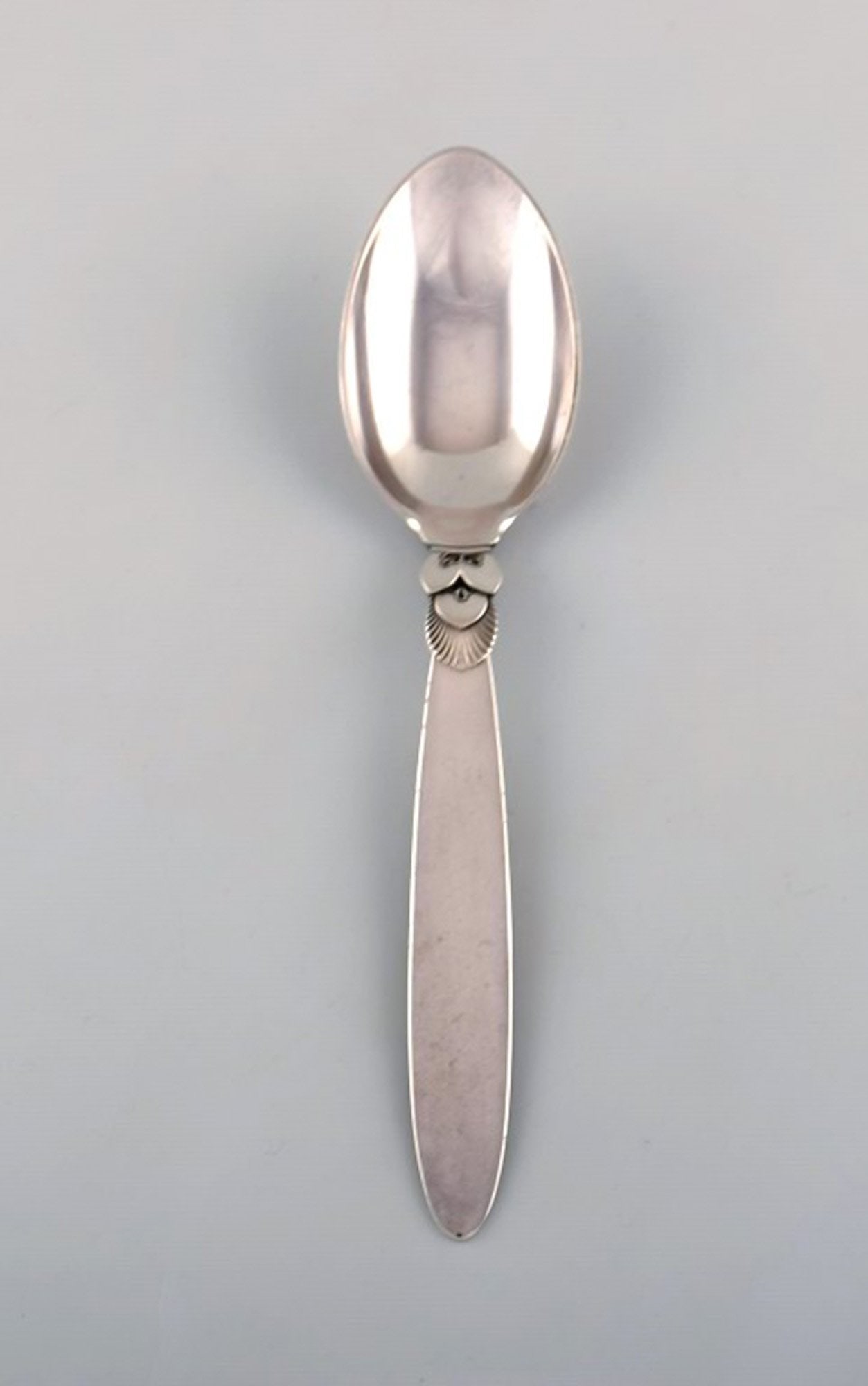 Georg Jensen "Cactus" dinner spoon in sterling silver. Dated 1933-44.: Title:Georg Jensen "Cactus" dinner spoon in sterling silver. Dated 1933-44. Description:Georg Jensen "Cactus" dinner spoon in sterling silver. Dated 1933-44. Designer: Gundorph Albertus. Length: 19 cm