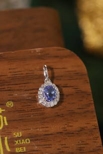PT900 Tanzanite Pendant: PT900 Tanzanite Pendant. Main Stone T0.38ct Accessory Stone D0.10ct Reserve: $500.00 Shipping: Domestic: Shipping rates are determined by destination International: Foreign shipping rates are determin