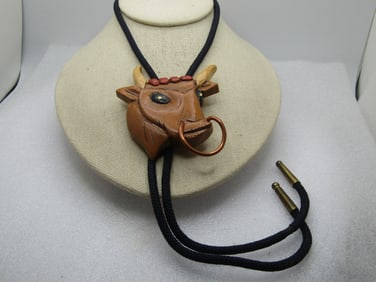Vintage Carved Wooden Bull with Ring Bolo Tie, 34" Black Cord, 1970's-1980's