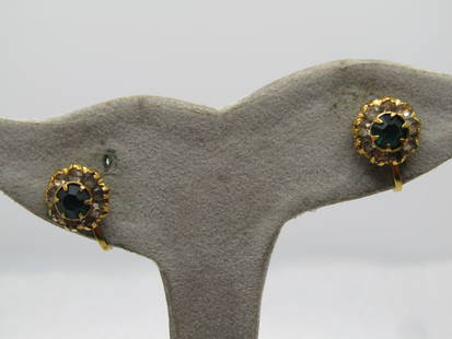 Vintage 12KT GF Green And Clear Halo Rhinestone Earrings, Screwback, 1940's.: Vintage 12KT GF Green And Clear Halo Rhinestone Earrings, Screwback, 1940's. Gold tone with a raised appx. 5mm prong-set emerald green rhinestone at center and a halo of appx. 2mm clear rhinestones se