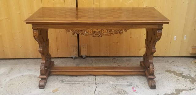 Antique Italian Renaissance Revival Ornate Walnut Carved Console Trestle Table: Vintage from before 2000 Materials: wood, walnut Antique Italian Renaissance Revival Ornate Walnut Carved Console Trestle Table Circa Early 20th Century Dimensions H 30" W 52" D 24" CONCONDITION: Rese