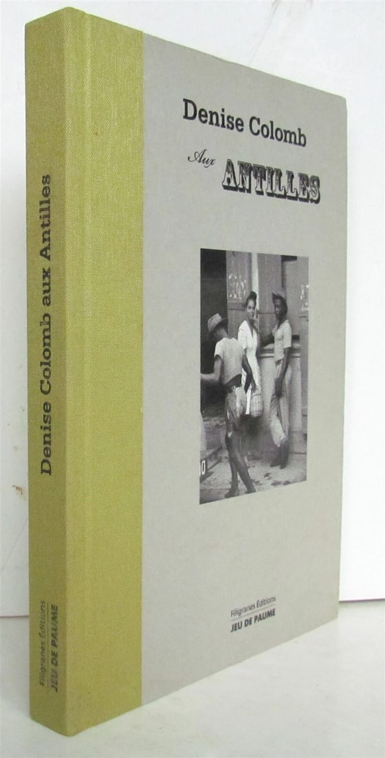 DENISE COLOMB AUX ANTILLES PHOTO ILLUSTRATED: Printed in France in 2009 hard bound. 143 pages, fully illustrated Size 6 3/4 by 9 3/4" Text in French Excellent condition except minor faded dampstain at the lower margin of front cover Please see my