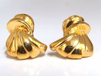 14kt shell form 3d clip on earrings 19 gram+: High shine & Wide, 3d shell form clip earrings Measurements of Earrings: .92 X .91 inch 19.3 grams / 14kt. yellow gold Earrings are gorgeous made Free UPS Insured overnight shipping. Reserve: $1,200.0