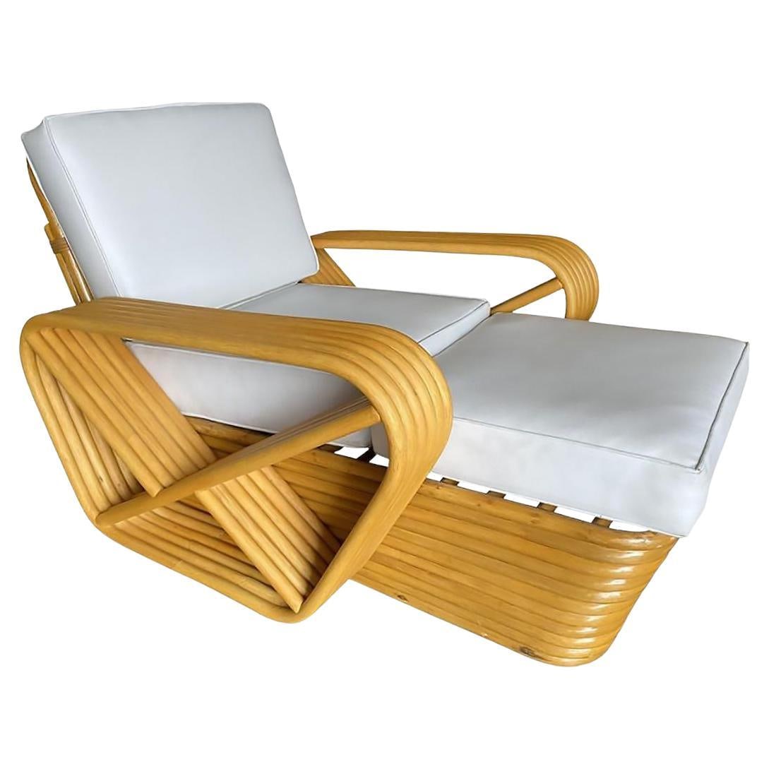 Restored Six-Strand Square Pretzel Rattan Chaise Lounge Chair: About the Item Designed in the manner of Paul Frankl, this six-strand, rattan chaise longue chair features square pretzel arms and a Classic stacked base. Cushions are display only, this will be made