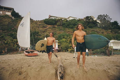 Slim Aarons 'Laguna Beach Surfers' 1970 Oversize C Type Print Framed In Black: Description Slim Aarons 'Laguna Beach Surfers' 1970 Oversize C Type Print Framed In Black Surfers with their dog at Laguna Beach, California, January 1970. Photo by Slim Aarons. C Type Open