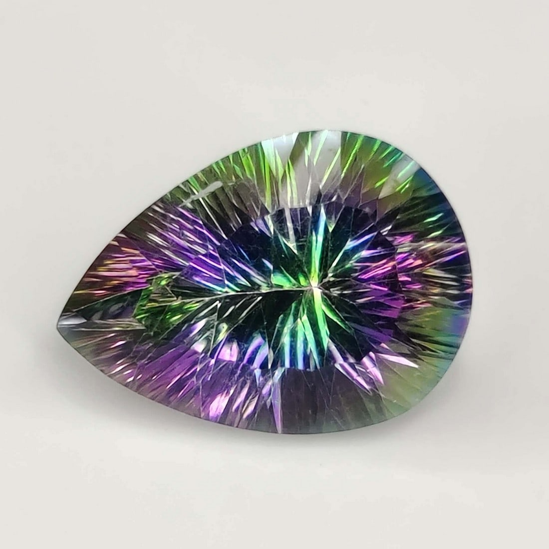 9.53 ct "Top Qulaity" Rainbow Mystic Quartz Concave: Title:9.53 ct "Top Qulaity" Rainbow Mystic Quartz Concave Description:Gemstones: Mystic Quartz / Carat Weights: 9.53 ct / Size or Dimensions: 15.80 X 11.90 X 8.30 mm / Treatment: Coated Materials &Tec