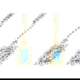 2.22 TW CTS BLUE TOPAZ & DIAMONDS 18K GOLD PLATED DESIGNER EAR-RINGS: BLUE TOPAZ OCTAGON 7X5 2PCS 1.85 CTS & ROUNDS 3MM 2 PCS 0.21 CTS & DIAMONDS 1.1MM 20 PCS 0.16 CTS Reserve: $35.00 Shipping: Domestic: Flat-rate of $17.65 to anywhere within the contiguous U.S. Interna