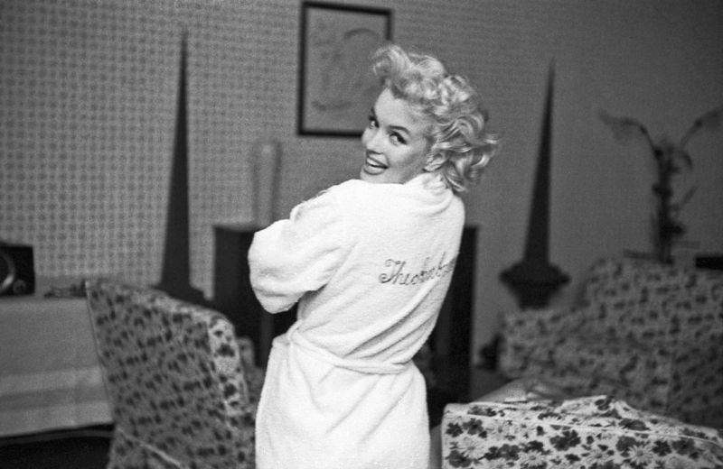 Ed Feingersh 'Ambassador Monroe' Marilyn Monroe Oversize Candid Silver Gelatin Print Unframed: Description Ed Feingersh 'Ambassador Monroe' Marilyn Monroe Oversize Candid Silver Gelatin Print Unframed Actress Marilyn Monroe wears an embroidered robe that reads ‘The Ambassador’ on Ma