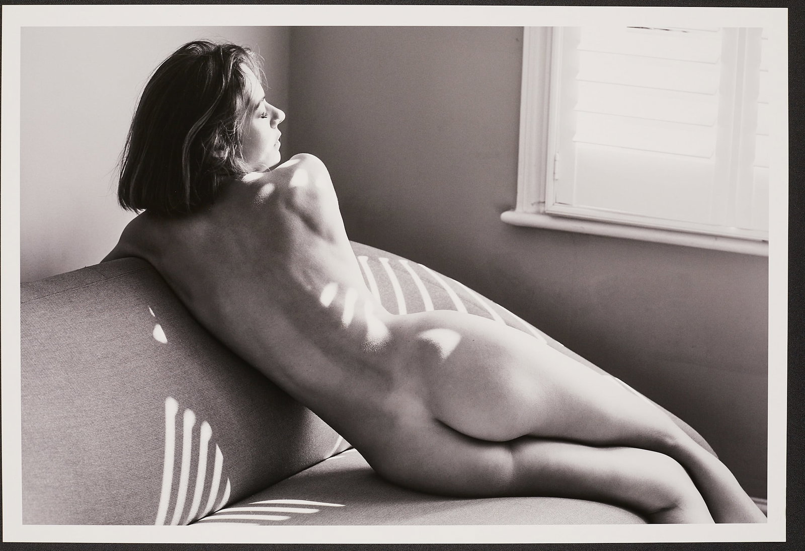 Spiros Politis (1969-)"Lady H, Couch" (2/25): Artist: Spiros Politis (1969-) Title: Lady H, Couch (2/25) Date: 2024 Medium: photography Dimensions: 19" x13" Lady H shot in London, 2024.Printed on Canson Baryta (310gsm)Stamped and signed and editi
