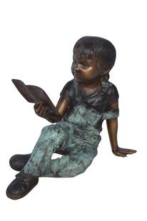 Young girl laying and reading book bronze statue - Size: 18"L x 9"W x 16"H.: Title: Young girl laying and reading book bronze statue - Size: 18"L x 9"W x 16"H. Description: Magnificent statue of a girl laying down and reading a book. The joy of youth, lost in a book and puttin