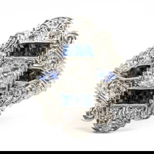 Art Deco Platinum Old Mine Cut Diamond and French cut Sapphire Ring: Title: Art Deco Platinum Old Mine Cut Diamond and French cut Sapphire Ring Description: Vintage from the 1920s Size: 7 1/2 US Materials: Platinum Gemstone: Diamond Adjustable The Bella ring is an auth
