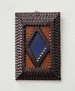 Tramp art frame with colored glass inserts: Title: Tramp art frame with colored glass inserts Description: The inner glass is blue, and the outer glass is a rust color. Colored glass in tramp art or other folk art is rare at the turn of the 19t