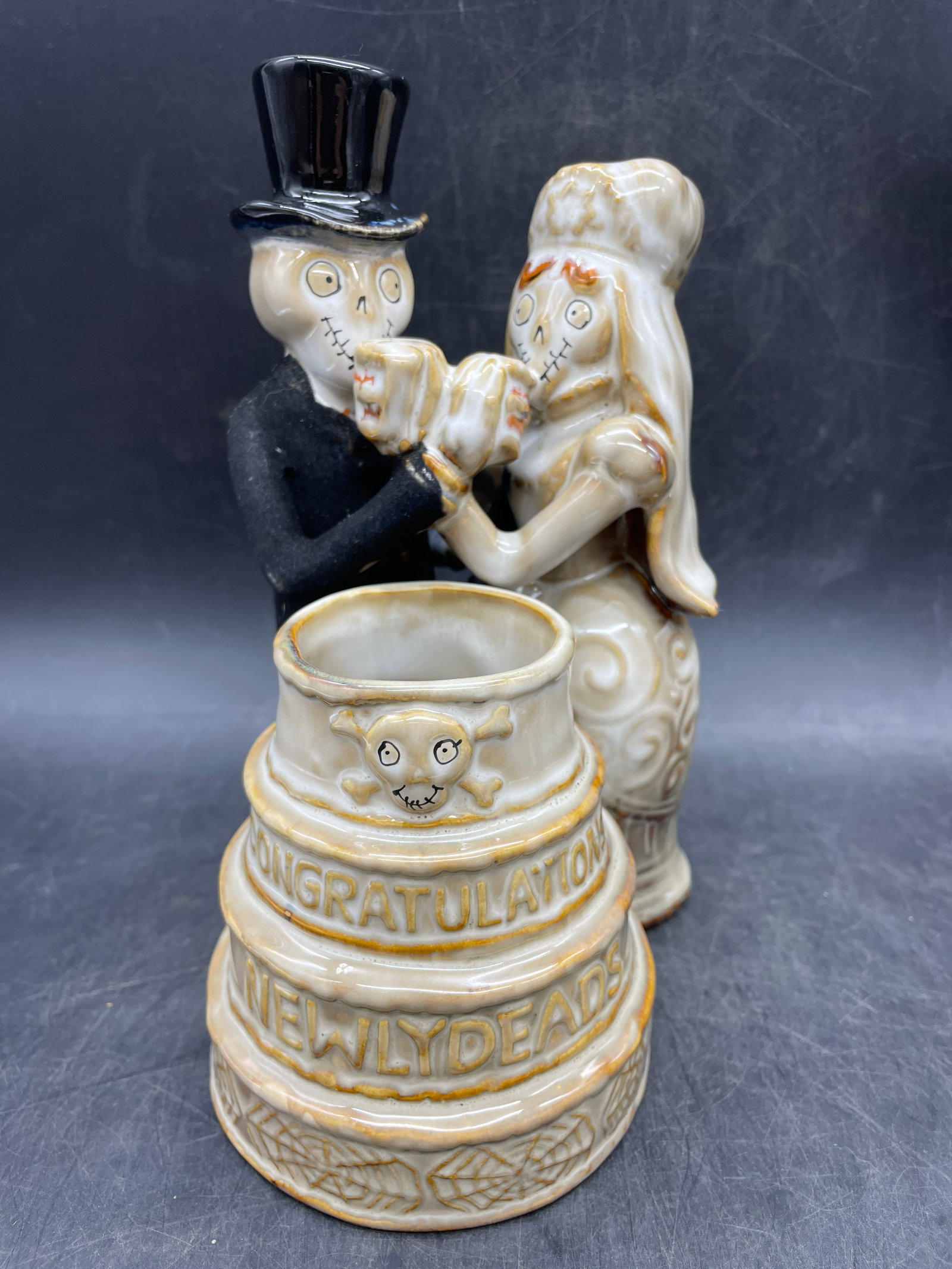 Boney Bunch Newlydeads Candle Holder: Title: Boney Bunch Newlydeads Candle Holder Date/Period: 2010 Dimension: Approx. 8" tall x 5.5 x 5 Material: ceramic Additional Information: Yankee Candle Holder Boney Bunch Newlydeads Bride Groom Wed
