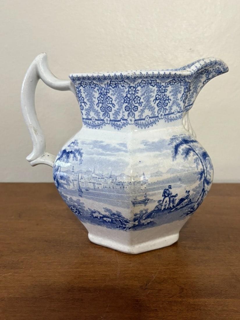 Charles Meigh Historical Staffordshire American Cities & Scenery Pitcher: It measures 6 7/8” h x 7 1/4” and is marked american cities and scenery. That was a historical series done by charles meigh around the 1830’s. It has a 1 1/2” hairline on the b