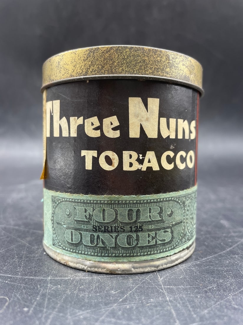 BELL'S THREE NUNS 4 0UNCE HARD TO FIND TOBACCO TIN: Title: BELL'S THREE NUNS 4 0UNCE HARD TO FIND TOBACCO TIN Date/Period: unknown Dimension: Approx 3" Material: metal, paper label Additional Information: THIS LISTING IS FOR A 4 OZ TALL EMPTY TIN OF TH