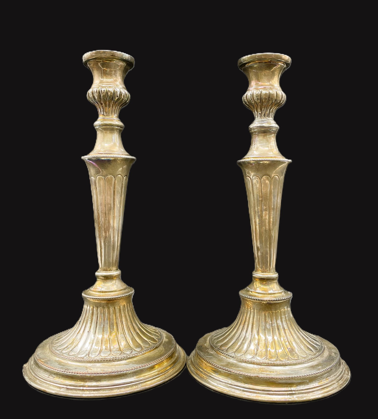 PAIR WILLIAM ADAMS ENGLAND CANDLESTICKS: Title: PAIR WILLIAM ADAMS ENGLAND CANDLESTICKS Date/Period: UNKNOWN Dimension: APPROX 11 X 5.5 Material: BELIEVE IT IS SILVER PLATED Additional Information: PAIR WILLIAM ADAMS ENGLAND CANDLESTICKS Shi