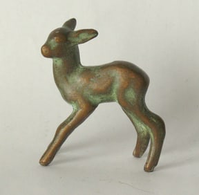 Vintage molded brass fawn paper weight.